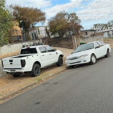 20261001-Item-380-White-Ford-Ranger-and-Ford-Sedan.jpg