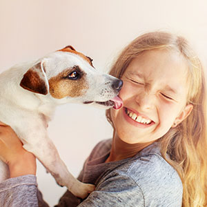 Girl with puppy, registration, microchipping